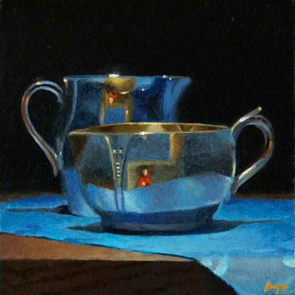 Silver Creamers on Blue Silk