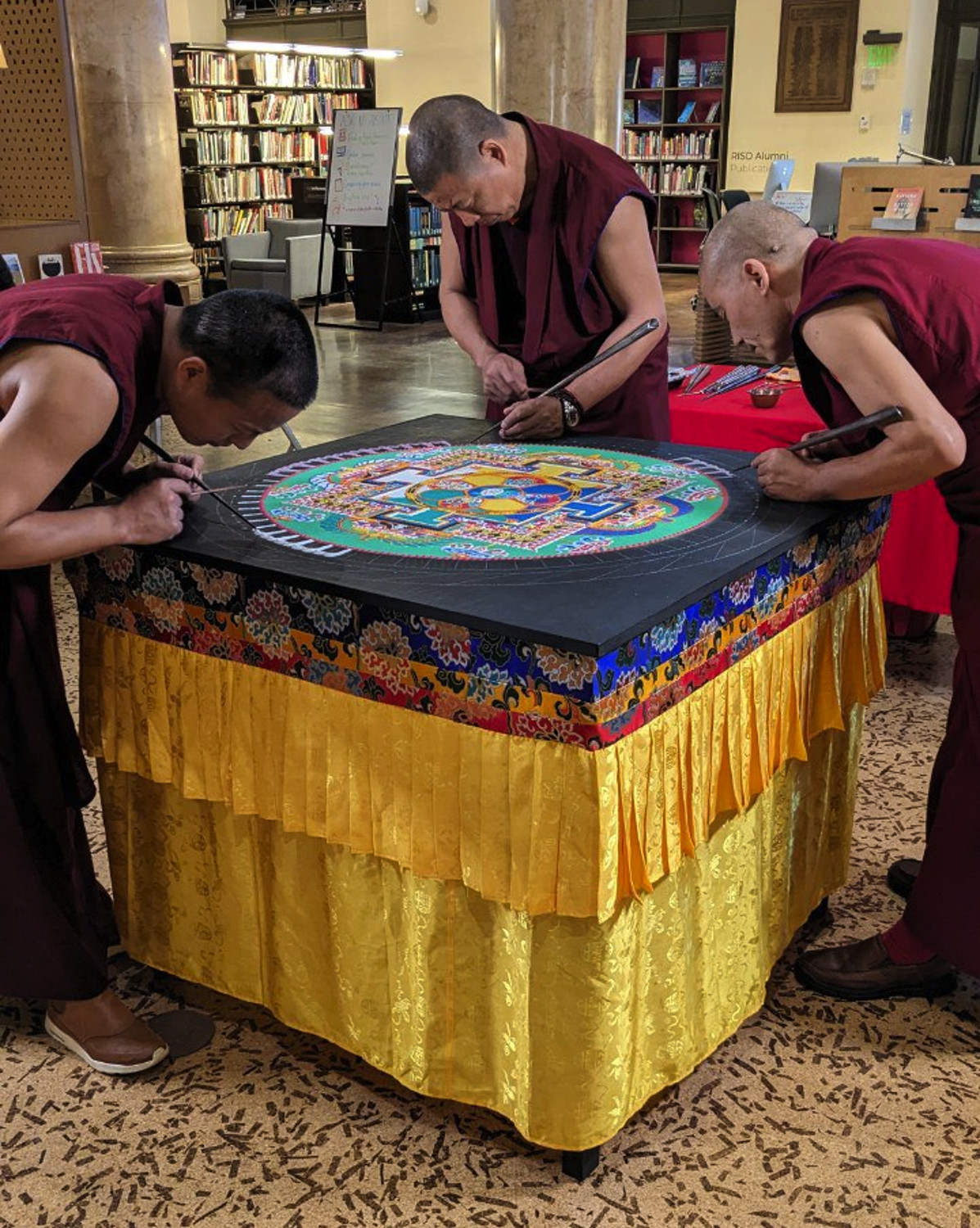 20240309a Monks working on the sand painting