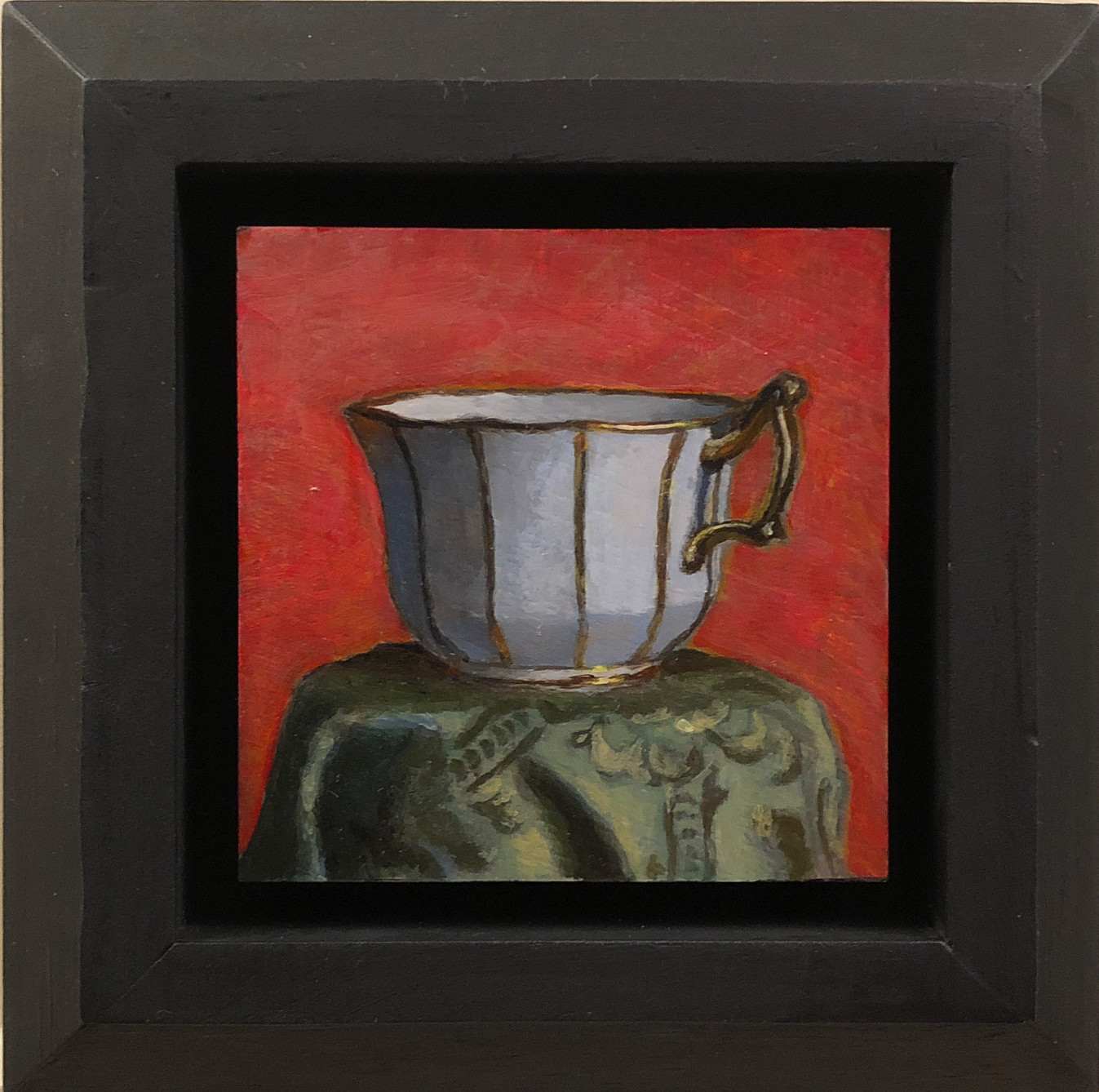 "Golden Teacup on Red"$275